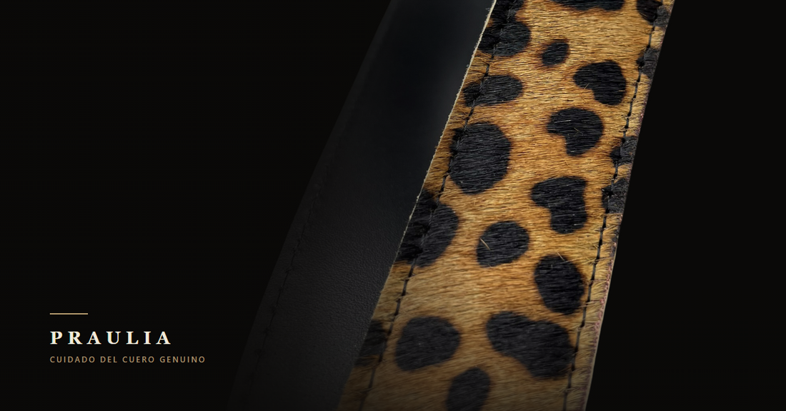 Detalle macro de un cinturón de cuero Praulia: pelo animal print, costura y canto de cuero negro